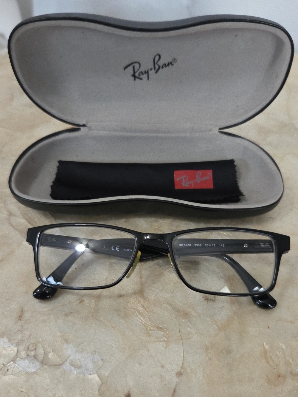 Ray-Ban RX6238 eyeglasses in a black, rectangular